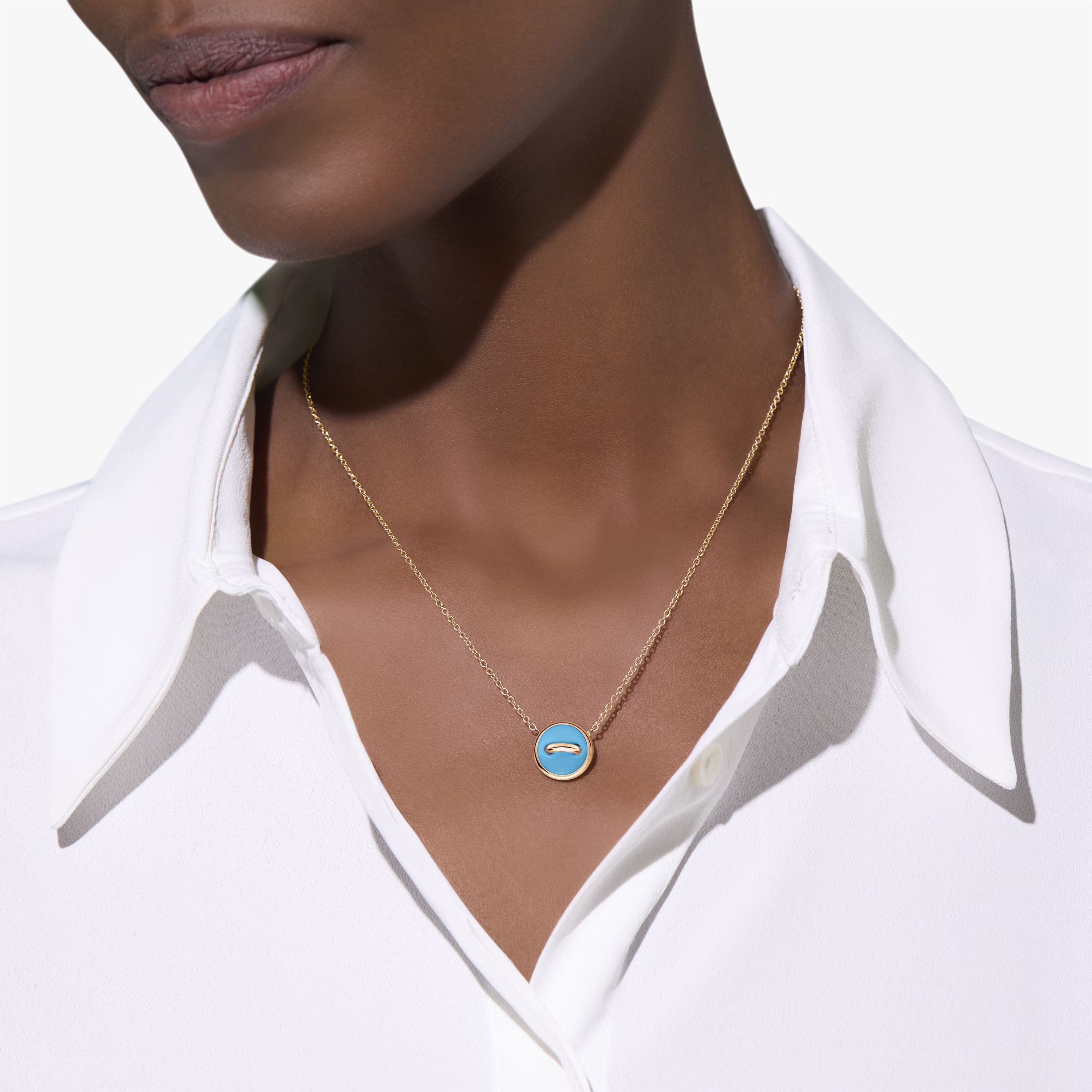 Collier à pois pompons en nacre blanche et grise