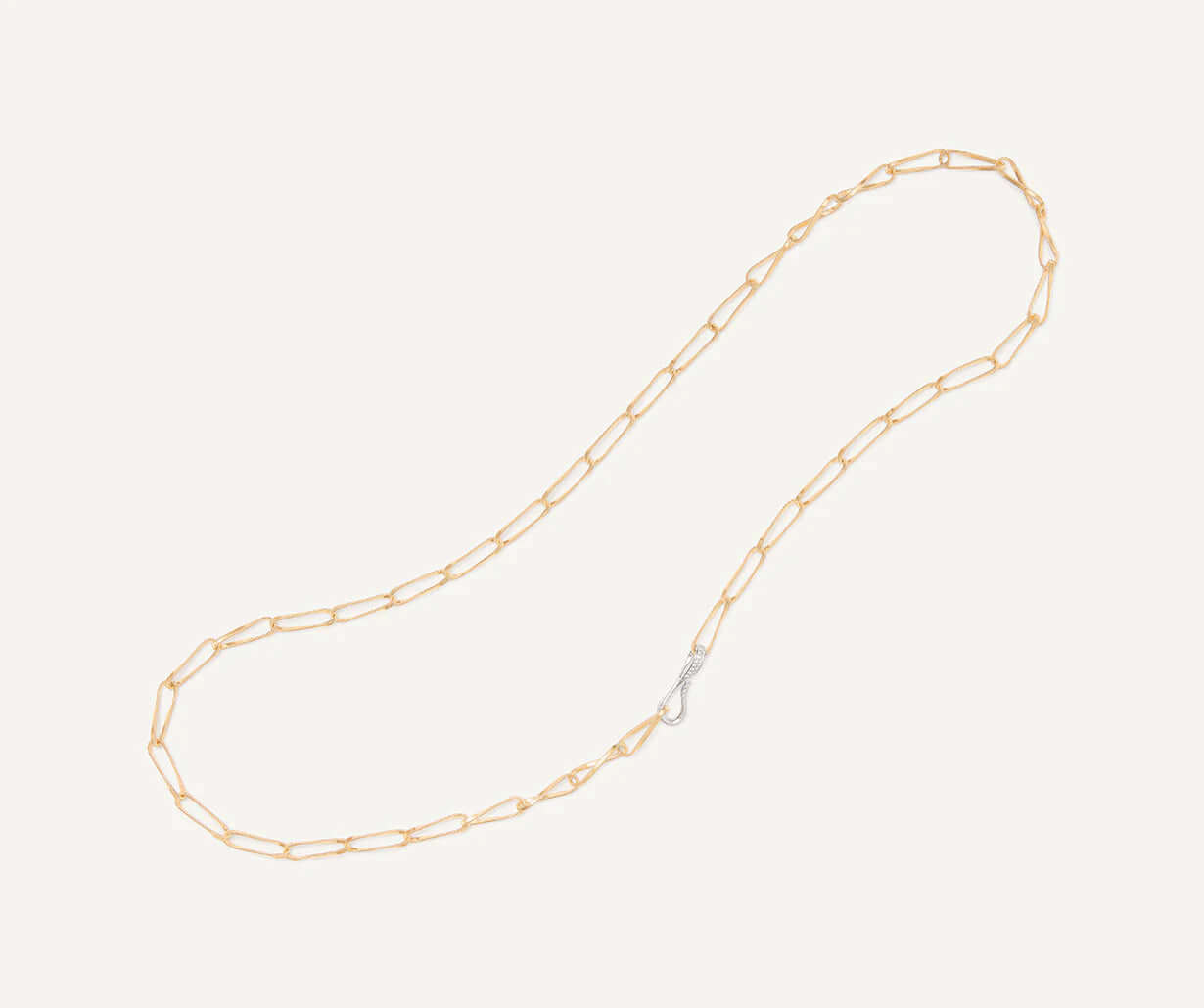 Collana Onde Marrakech Lunga in oro giallo 18 kt con lavorazione a spirale ed elegante design a otto.
